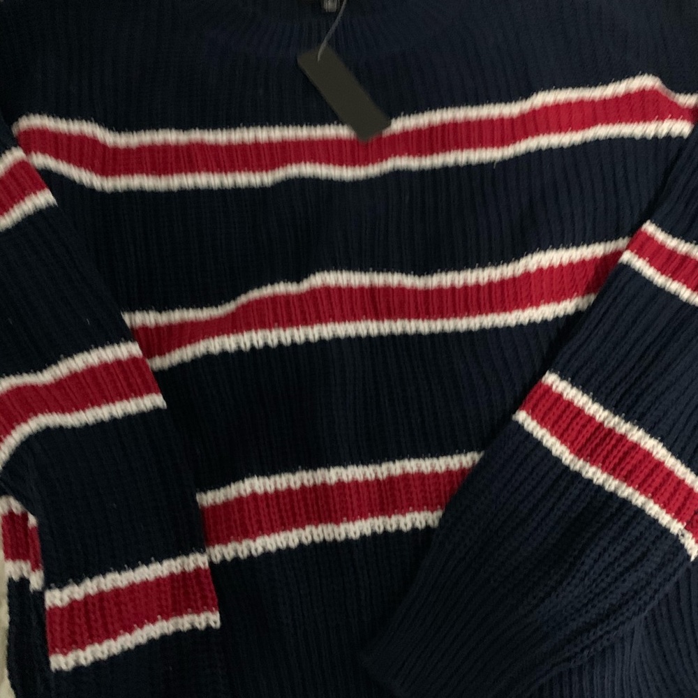 Brand new navy and red sweater